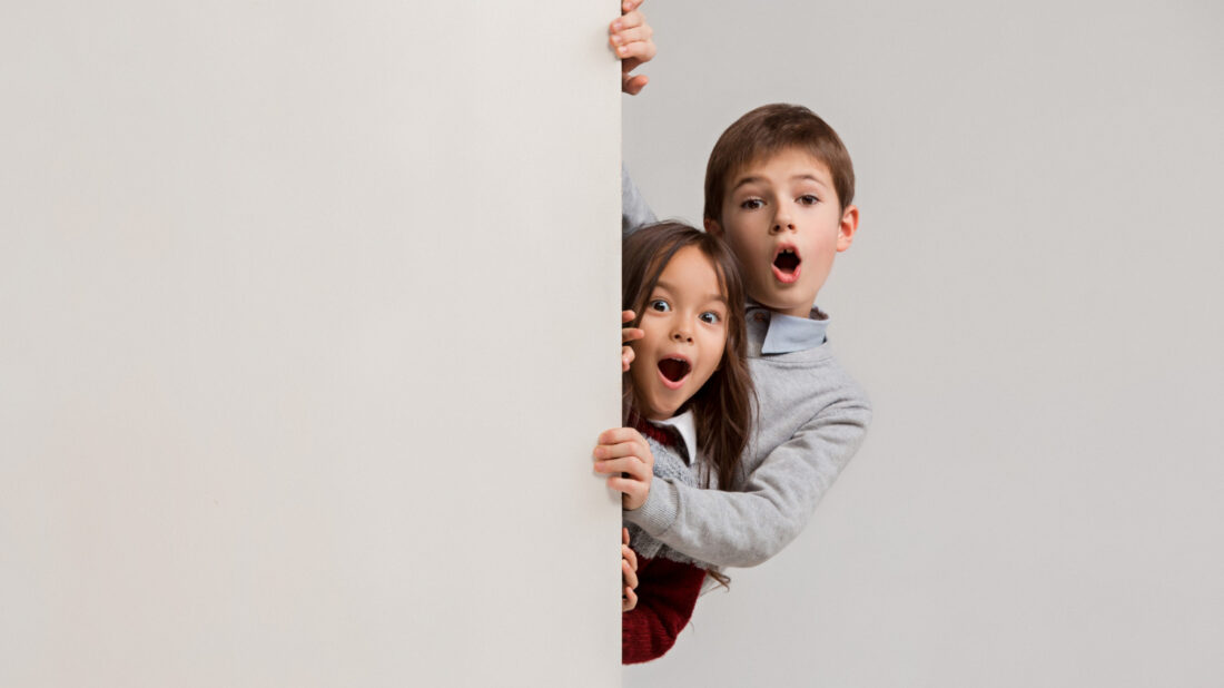 banner-with-surprised-children-peeking-edge-1-1100x618.jpg