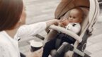 mum-sitting-bench-woman-pushing-her-toddler-sitting-pram-family-concept1-144x81.jpg